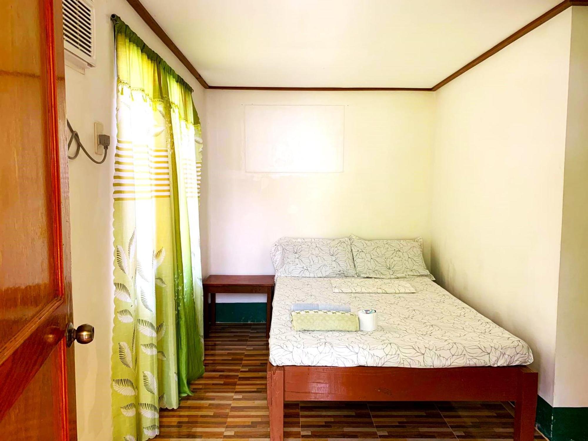Divinagracia Cottages San Vicente  Luaran gambar