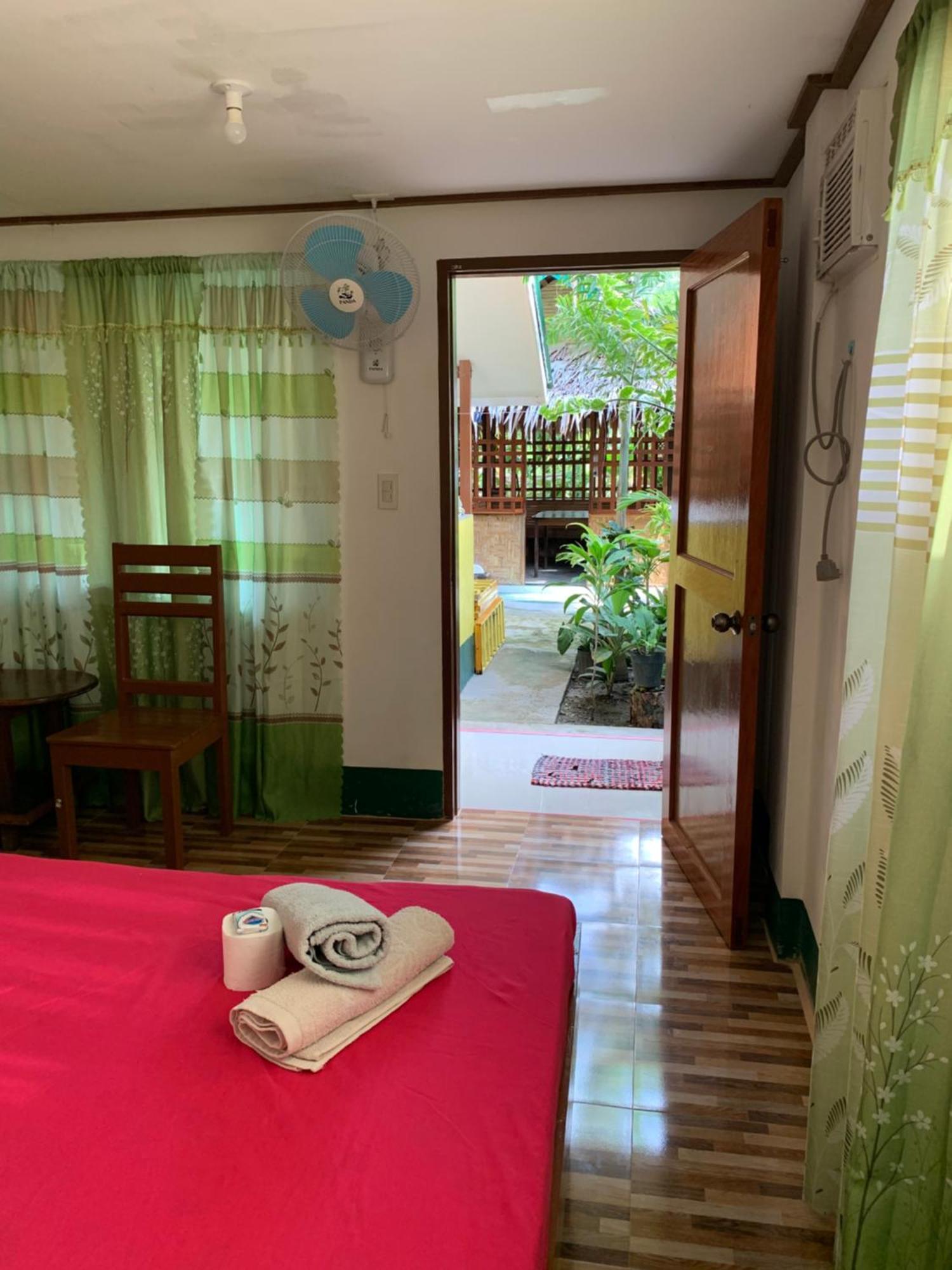 Divinagracia Cottages San Vicente  Luaran gambar